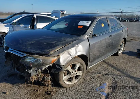 2014 Toyota Camry Le z USA, uszkodzony, nr VIN 4T4BF1FK0ER400647